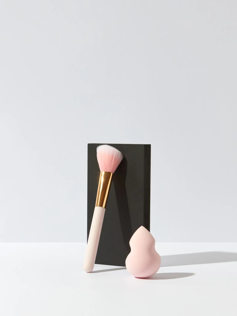Heavy Petal cannabis packaging system photographed on a bone backdrop